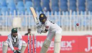 Sir Lanka's Oshada Fernando plays a shot during the first day of the first Test cricket match between Pakistan and Sri Lanka at the Pindi Cricket Stadium in Rawalpindi on December 11, 2019. / AFP / Aamir QURESHI 