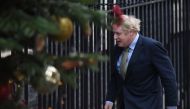 Boris Johnson arrives at 10 Downing Street in central London on December 13, 2019, following an audience with Britain's Queen Elizabeth II at Buckingham Palace, where she invited him to become Prime Minister and form a new government.  AFP / Oli Scarff
 