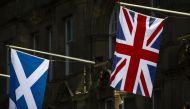 Flags of Scotland and the Union hang from flagpoles in Edinburgh, Scotland, on April 11, 2019. AFP / Andy Buchanan