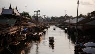 Small boats maneuver through the Amphawa floating market at Samut Songkhram province March 16, 2013. Reuters/Damir Sagolj