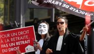 French lawyers attend a demonstration to protest against pension reforms in Paris, France, September 16, 2019. Reuters / Charles Platiau