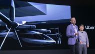Eric Allison (L), Head of Uber Elevate, and Jaiwon Shin, Head of Urban Air Mobility at hyundai, talk about the S-A1 electric vertical takeoff and landing (eVTOL) aircraft at the Hundai news event where hyundai announced it's partnership with Uber to creat