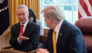 (FILES) In this file photo China's Vice Premier Liu He (L) speaks with US President Donald Trump during a trade meeting in the Oval Office at the White House in Washington, DC, on April 4, 2019. AFP / Jim Watson 