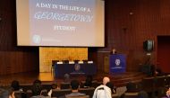 The Assistant Director of Admissions at Georgetown University in Qatar, Mariam Lachin, addressing the students at the open house. 
