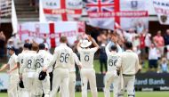 Cricket - South Africa v England - Third Test - St George's Park, Port Elizabeth, South Africa - January 20, 2020 England's Stuart Broad, Joe Root and teammates applauds fans after the match REUTERS/Siphiwe Sibeko
