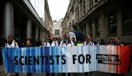 Protesters hold a banner outside the BlackRock office during an Extinction Rebellion demonstration in the City of London, Britain, October 14, 2019. Reuters / Henry Nicholls
