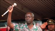  In this file photo taken on December 28, 1992 Kenya's President Daniel Arap Moi, who is also the leader of the ruling Kenyan African National Union (KANU) party shown brandishing a stick as he addresses members of his party/ AFP / ALEXANDER JOE