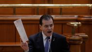 Romanian interim PM Ludovic Orban delivers a speech before a no-confidence vote session in Parliament in Bucharest, Romania February 5, 2020. Inquam Photos/George Calin via Reuters