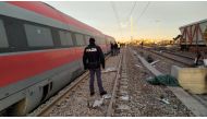 Police are seen at the scene where a high-speed train travelling from Milan to Bologna derailed, in Lodi, Italy February 6, 2020. Polizia di Stato