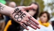#MeToo on the hand of a protester during a gathering called by the Effronte-e-s Collective on the Place de la Republique square in Paris on October 29, 2017. AFP / Bertrand Guay