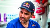 The defending champion, Qatar's Nasser Saleh Al Attiyah and French navigator Matthieu Baumel driving their Toyota Hilux during the opening 171.25km selective section of the Manateq Qatar Cross-Country Rally, yesterday.