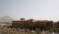 General view taken on February 25, 2020 of the H10 Costa Adeje Palace Hotel in La Caleta, where hundreds of people were confined to their rooms after an Italian tourist was hospitalised with a suspected case of coronavirus.  AFP / Desiree Martin
 