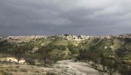 A picture taken from the E1 corridor, a super-sensitive area of the occupied West Bank, shows Israeli settlement of Maale Adumin in the background on February 25, 2020. AFP / Menahem Kahana
 