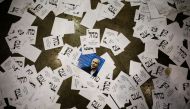 Israeli Prime Minister Benjamin Netanyahu's Likud party election ballots are seen on the floor following Netanyahu's address to supporters at the party headquarters in Tel Aviv, Israel March 3, 2020. Reuters/Amir Cohen
 