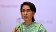 Myanmar State Counsellor Aung San Suu Kyi speaking at the International Enterprise Global Conversation on November 30, 2016 in Singapore. AFP / Roslan Rahman.
