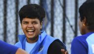 India's Shafali Verma (C) shares a lighter moment with teammates in the nets ahead of the Twenty20 women's World Cup cricket final, in Melbourne on March 7, 2020. AFP / William West  
