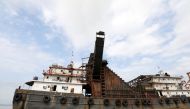 The Star Optimus, a hopper dredger vessel that belongs to Starhigh Asia Pacific, sits docked on the Salween river in Mawlamyine, Mon state, Myanmar September 18, 2019. 2019. Reuters/Ann Wang