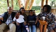 Joshua Babu and his wife Emily Chelangat, who lost their son and daughter-in-law to the Ethiopian Airlines Flight 302, sit with their family members during a Reuters interview at their home in Nairobi, Kenya March 7, 2020. Reuters/Njeri Mwangi 
 