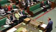 A handout picture released by the UK Parliament shows Britain's Health and Social Care Secretary Matt Hancock (R) speaking during Oral Questions to the Secretary of State for Health and Social Care in the House of Commons in London on March 10, 2020 /AFP/