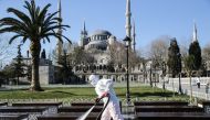 :ISTANBUL, TURKEY - MARCH 21: Health officials carry out disinfecting works at Sultanahmet Square as a precaution against coronavirus (Covid-19) pandemic in Istanbul, Turkey on March 21, 2020. ( Elif Öztürk - Anadolu Agency )