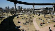 People enjoy a picnic at a Han River Park following the outbreak of the coronavirus disease (COVID-19), in Seoul, South Korea April 4, 2020. REUTERS/Heo Ran 