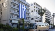A bus which will carry Turkish citizens who quarantined due to coronavirus (COVID-19) at the Greek cruise ship 