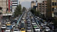 FILE PHOTO: A general view of traffic, following the outbreak of the coronavirus disease (COVID-19), after shopping malls and bazaars reopened in Tehran, Iran, April 20, 2020. WANA (West Asia News Agency)/Ali Khara via Reuters