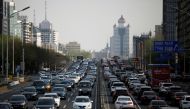 :FILE PHOTO: Cars are seen in a traffic jam during evening rush hour in Beijing, as the country is hit by an outbreak of the novel coronavirus (COVID-19), China April 8, 2020. REUTERS/Tingshu Wang/File Photo
