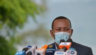 Ehiopia's Prime Minister Abiy speaks before planting a tree during the tree-planting ceremony of his initial project to plant five billion trees during this year's rainy season in Hawassa on June 5, 2020, ahead of World Environment Day. / AFP / Michael TE