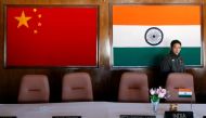 A man walks inside a conference room used for meetings between military commanders of China and India, at the Indian side of the Indo-China border at Bumla, in the northeastern Indian state of Arunachal Pradesh, November 11, 2009. REUTERS/Adnan Abidi/File
