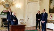 Ireland's new prime minister Micheal Martin (R) attends a meeting with Ireland's President Michael D. Higgins (L) to be formally appointed at Aras an Uachtarain in Dublin on June 27, 2020.AFP / MAXWELLS