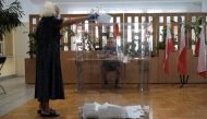 A woman casts her ballot at a polling station during the presidential election in Warsaw, Poland, June 28, 2020. Slawomir Kaminski/Agencja Gazeta