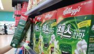 A clerk displays Kellogg's green onion-flavored cereal at a supermarket in Seoul, South Korea, June 30, 2020. REUTERS/Daewoung Kim