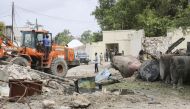 Construction equipment is seen at site after an attack to the tax collection building carried out with a bomb-laden vehicle in Mogadishu, Somalia on July 4, 2020. ( Sadak Mohamed - Anadolu Agency )
