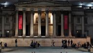 People gather in Trafalgar Square, as restrictions are eased following the outbreak of the coronavirus disease (COVID-19), in London, Britain July 4, 2020. REUTERS/Henry Nicholls