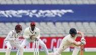 England's Dom Sibley plays a shot on the first day of the second Test cricket match between England and the West Indies at Old Trafford in Manchester, northwest England on July 16, 2020.