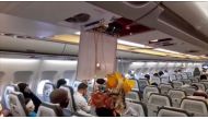 An image grab from a video released by state-run Iran Press news agency on July 24, 2020, reportedly shows released oxygen mask in the cabin of an Iranian passenger plane after it was intercepted by a US F-15 while flying over Syria.