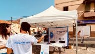 FILE PHOTO: Volunteers show residents how to install an app to trace contacts with people potentially infected with the coronavirus disease (COVID-19) being trialled on the Canary Island of La Gomera, Spain, July 3, 2020. Alejandro Noda/via REUTERS/File P