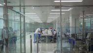 Staff are seen in the COVID-19 vaccine production facility area at the Bio Farma office amid the coronavirus pandemic in Bandung, West Java province, Indonesia August 4, 2020. Antara Foto/Dhemas Reviyanto 