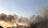 Smoke rises after an explosion was heard in Beirut, Lebanon August 4, 2020. REUTERS/Issam Abdallah