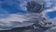 Mount Sinabung spews thick ash and smoke into the sky in Karo, North Sumatra on August 10, 2020. / AFP / Anto Sembiring