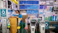 A vendor waits for customers inside a store selling medical and personal protective equipment, amid the coronavirus disease (COVID-19) outbreak, in Manila, Philippines August 10, 2020. REUTERS/Eloisa Lopez