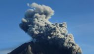 Mount Sinabung volcano spews volcanic material as seen from Tiga Pancur village in Karo, North Sumatra province, Indonesia, August 23, 2020, in this photo taken by Antara Foto. Antara Foto/Edy Regar/via REUTERS