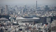 The National Stadium, the main stadium of Tokyo 2020 Olympics and Paralympics, is seen from an observation desk in Tokyo, Japan July 20, 2020. REUTERS/Issei Kato/File Photo