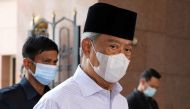 Malaysia's Prime Minister Muhyiddin Yassin wearing a protective mask arrives at a mosque for prayers, amid the coronavirus disease (COVID-19) outbreak in Putrajaya, Malaysia August 28, 2020. REUTERS/Lim Huey Teng