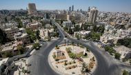 This picture taken on August 28, 2020 shows a view of an empty roundabout during a COVID-19 coronavirus pandemic curfew in the centre of Jordan's capital Amman. Jordan on August 28 started imposing a full curfew in Amman and Zarqa, 23 kilometres north-eas