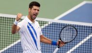 In this file photo Novak Djokovic of Serbia celebrates his win over Milos Raonic of Canada in the men's singles final of the Western & Southern Open at the USTA Billie Jean King National Tennis Center on August 29, 2020 in the Queens borough of New York C