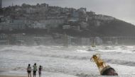 A general view shows a buoy that was un-tethered during heavy swell brought by Typhoon Maysak overnight on Haeundae beach in Busan on September 3, 2020. / AFP / Ed JONES