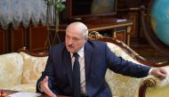 Belarus President Alexander Lukashenko speaks with Russian Prime Minister during their meeting at the Independence Palace in Minsk on September 3, 2020. AFP / Sputnik / Alexander ASTAFYEV