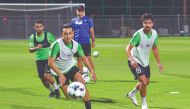 Al Rayyan players in action during a pre-match training session